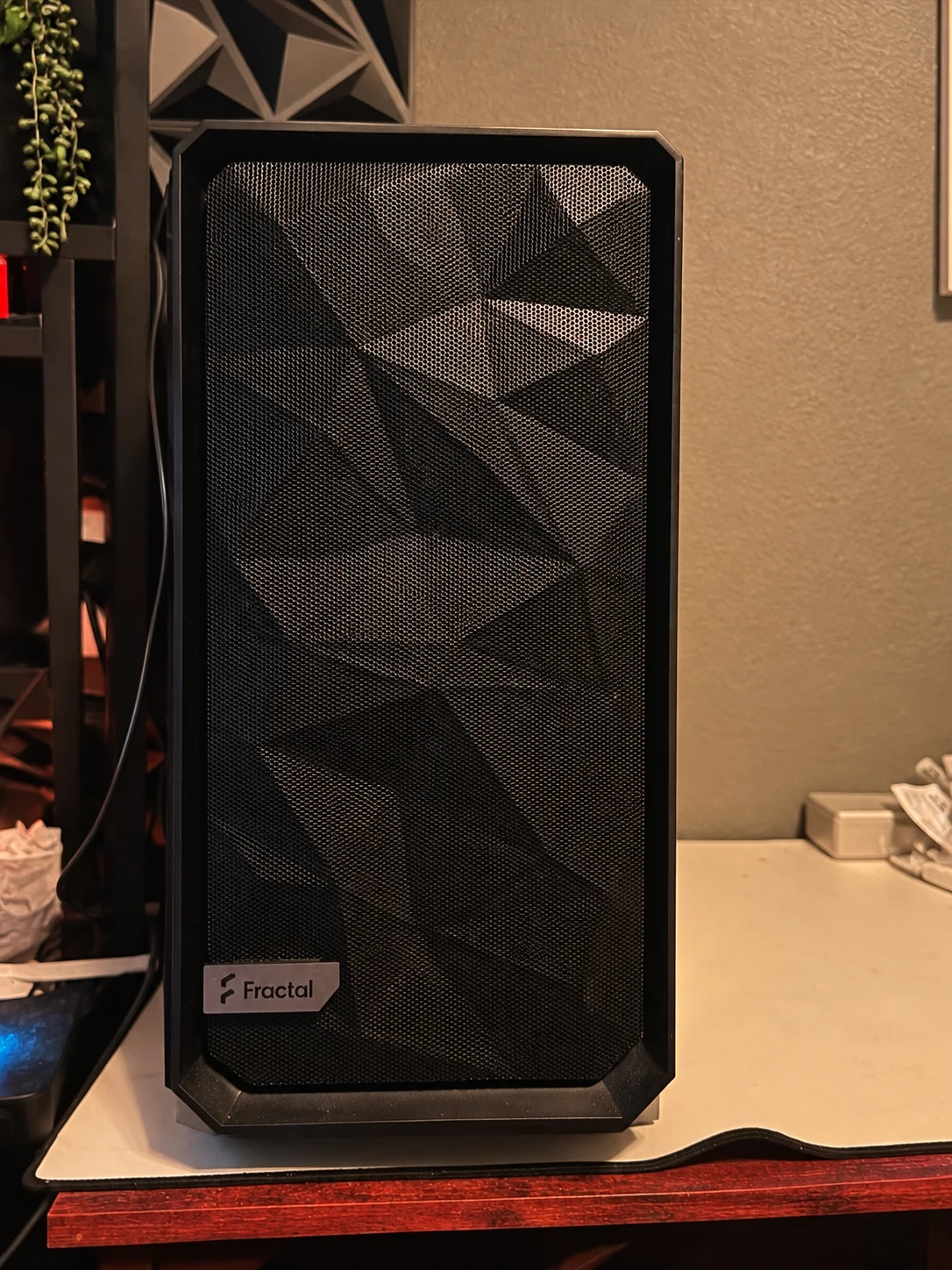 Shayde's black Fractal PC on his own desk; photo retouched for lighting and reflections